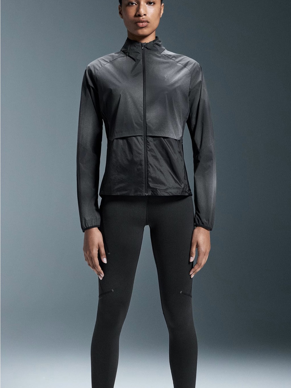On Running Women's Black Reflective Weather Jacket Lumos